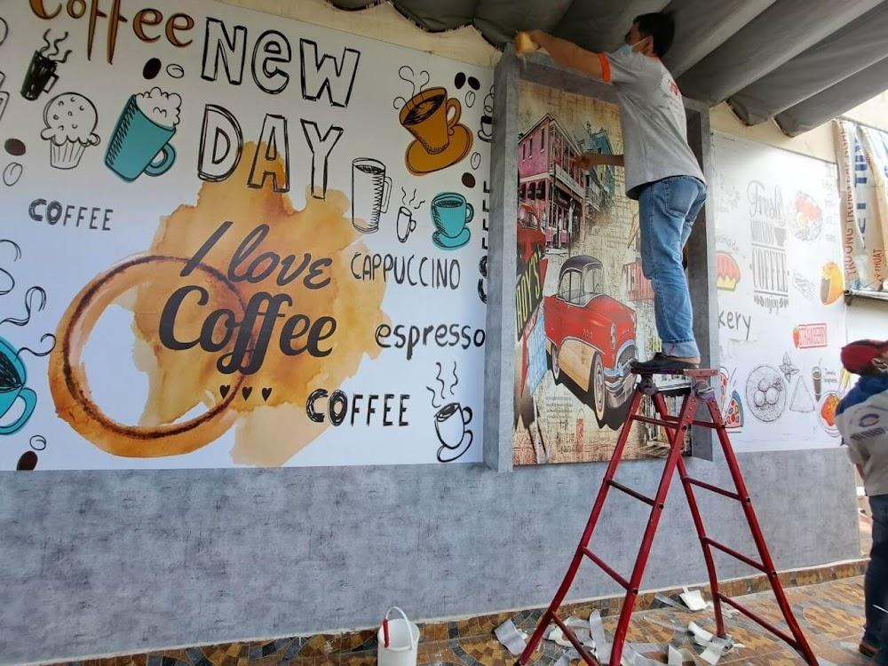 thi công tranh giấy dán tường quán cà phê ở Nguyễn Huệ